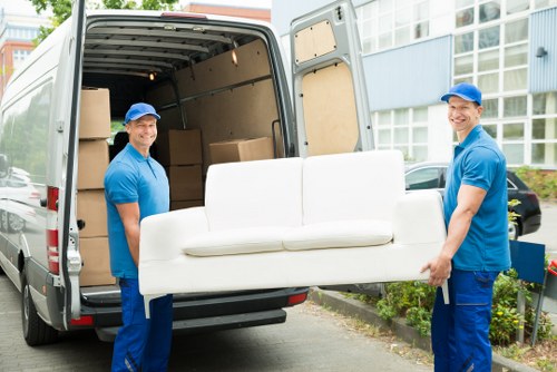 Professional local removals planning in Camden with moving boxes and furniture